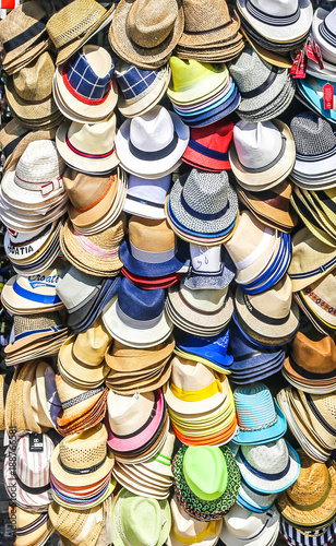 Hat stall in a market in Croatia during summer