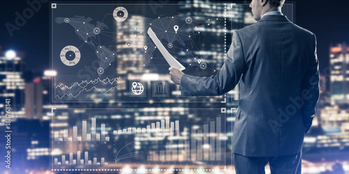 Digital background with infographs and man extending papers or c