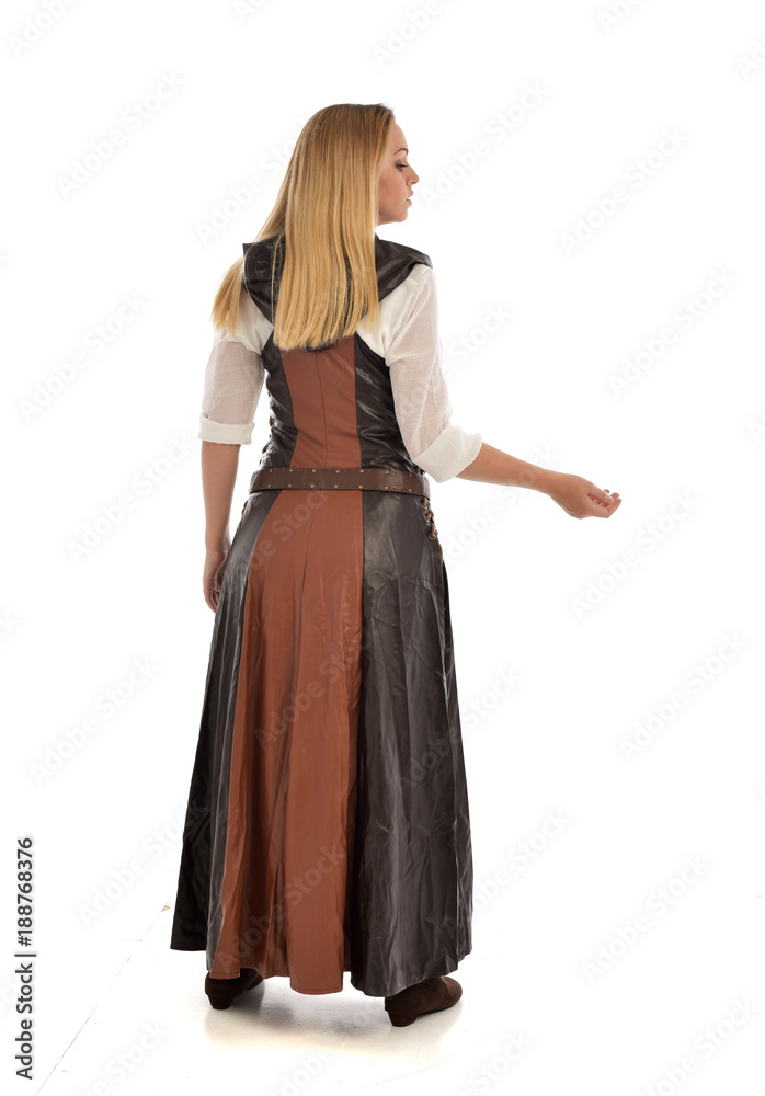 full length portrait of girl wearing brown  fantasy costume, standing pose with back to the camera on white studio background. 