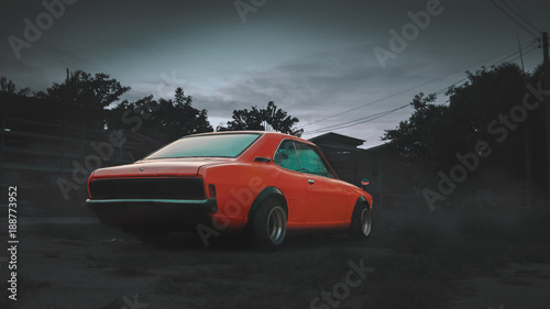 Obraz na płótnie orange, lowered retro car w salonie