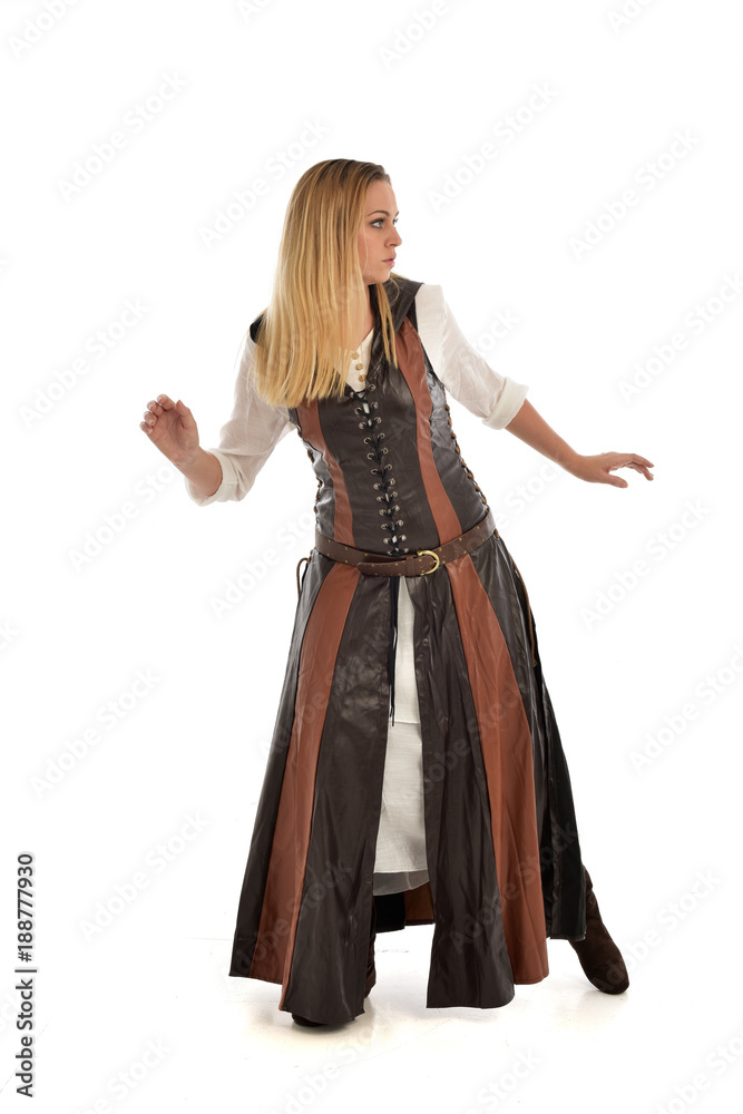 full length portrait of girl wearing brown  fantasy costume, standing pose with back to the camera on white studio background. 