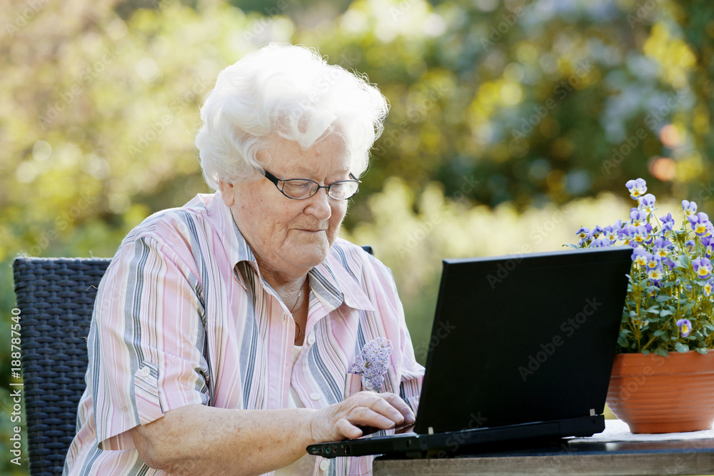 Senior woman using laptop Senior woman using laptop