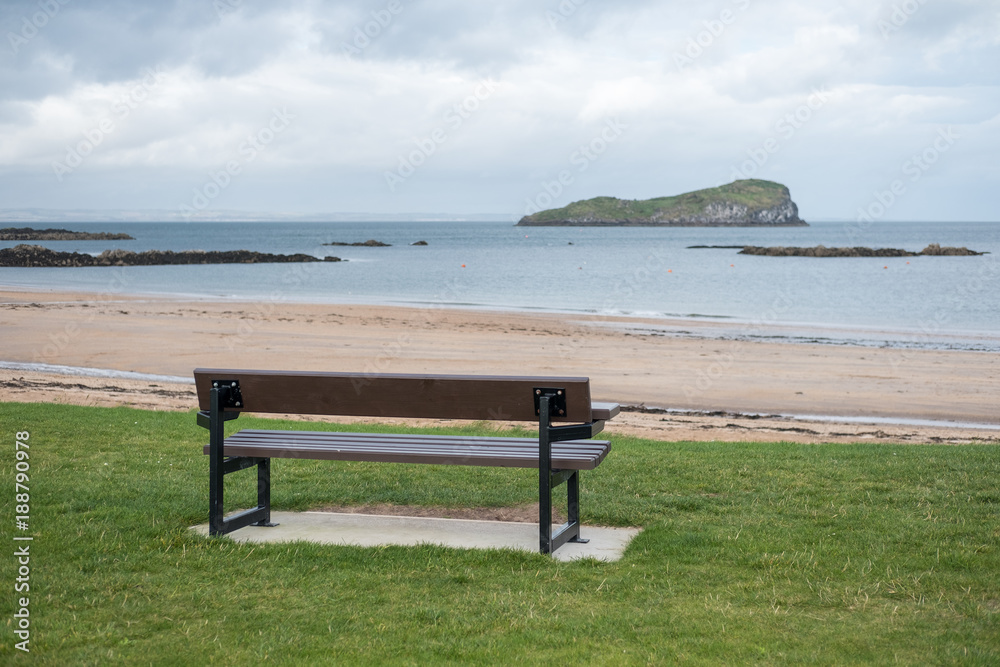 A bench, next to the sea