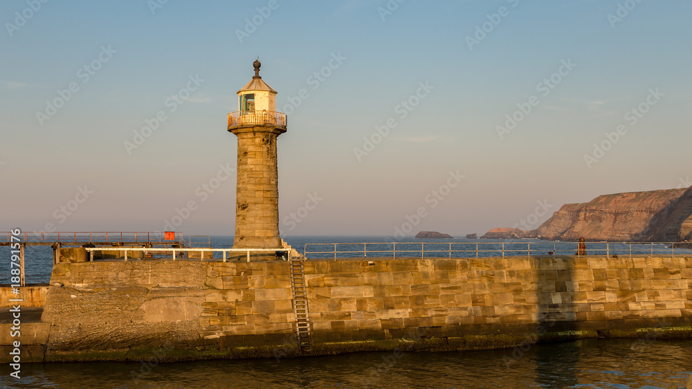 Evening light at the North Sea Coast and Whitby Pier, North Yorkshire, UK Evening light at the North Sea Coast and Whitby Pier, North Yorkshire, UK