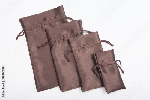 Group of brown pouches for jewelry
