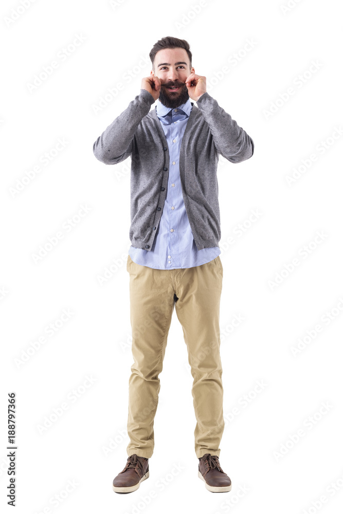 Smiling bearded hipster twirling mustache wearing smart casual clothes. Full body length portrait isolated on white studio background. Smiling bearded hipster twirling mustache wearing smart casual clothes. Full body length portrait isolated on white studio background.