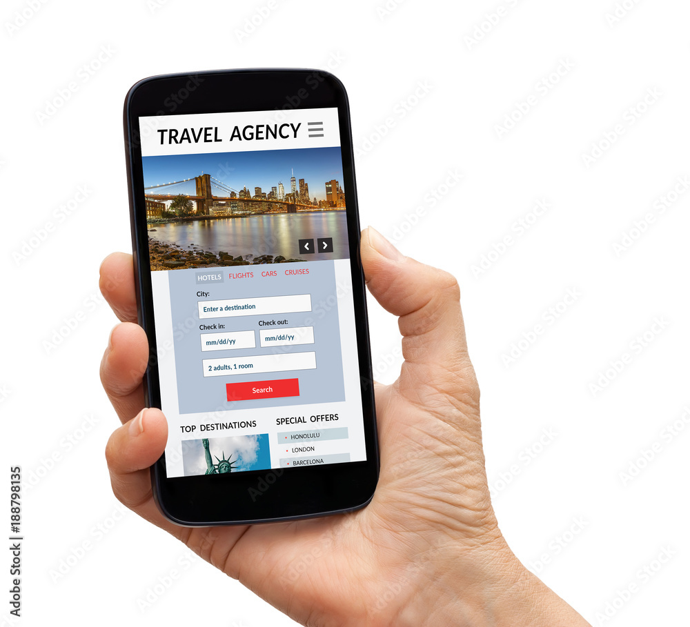 Hand holding a black smart phone with travel agency concept on screen. Isolated on white background. All screen content is designed by me. Hand holding a black smart phone with travel agency concept on screen. Isolated on white background. All screen content is designed by me.