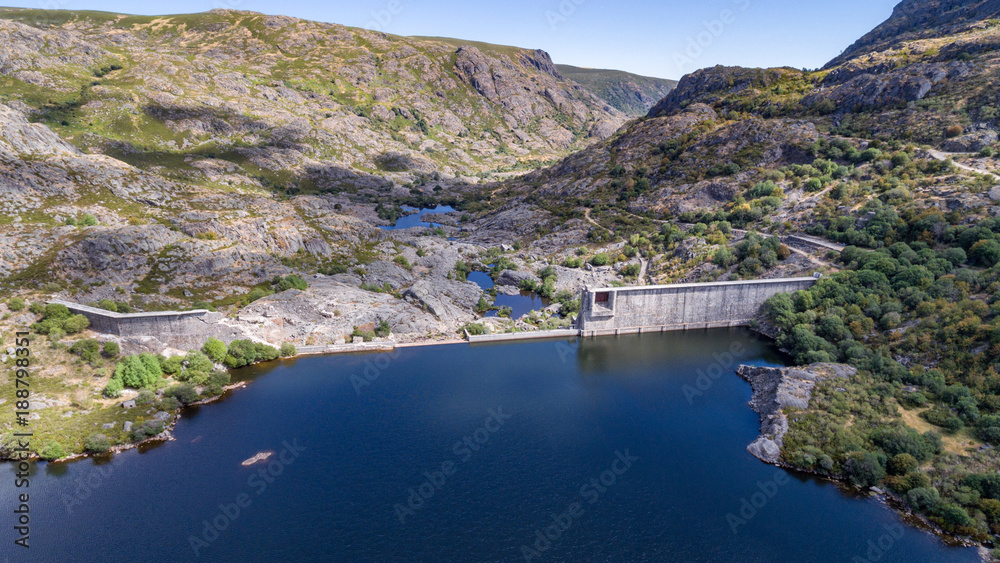 Aerial view of ruined dam on top of mountain