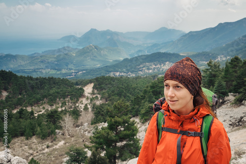 Portrait of optimistic female traveler on a background Antalya