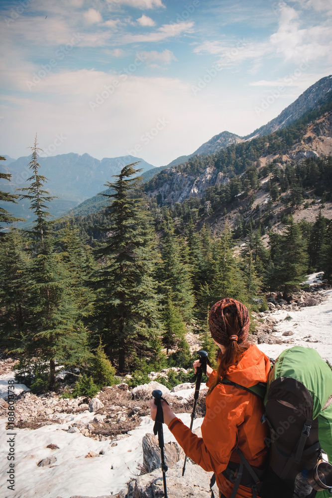 Female hiker enjoying marvelous view of mountain on lycian way Female hiker enjoying marvelous view of mountain on lycian way