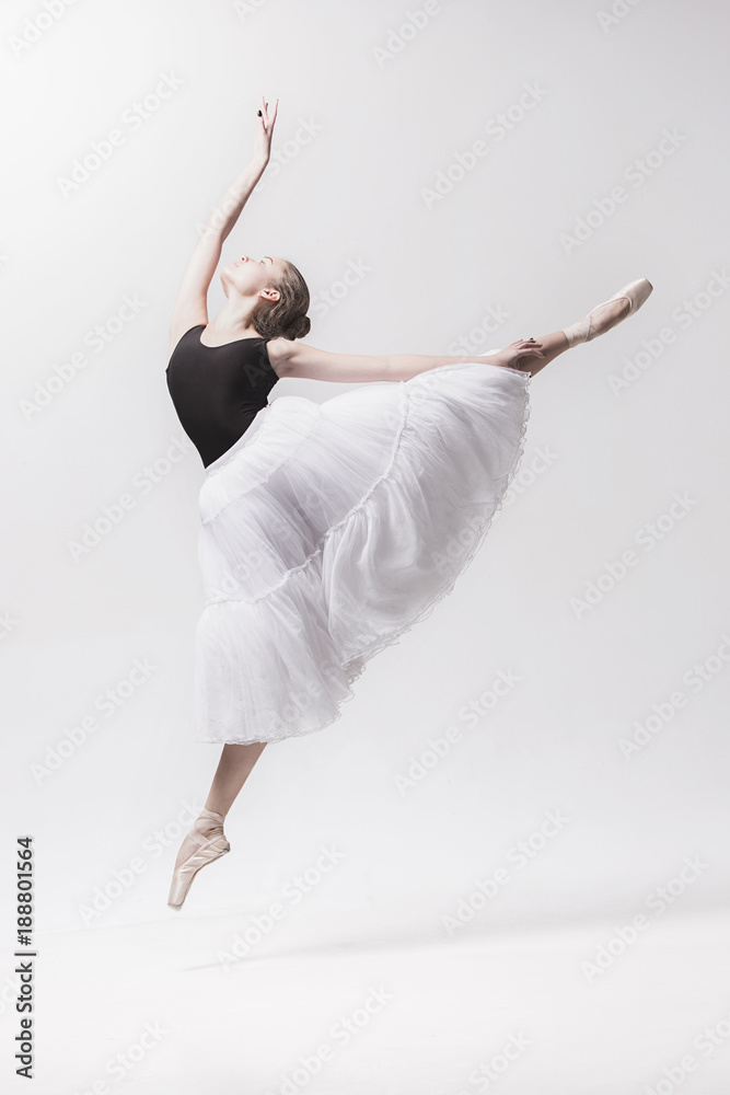 Young classical dancer isolated on white background.