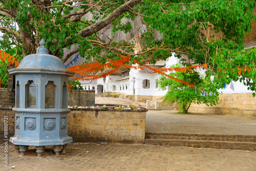 Shrine near Holy bodhi ficus tree in the Dambulla Golden temple cave complex