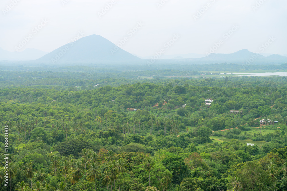 Hilly landscape view from sacred Dambulla Golden Cave Temple Hilly landscape view from sacred Dambulla Golden Cave Temple