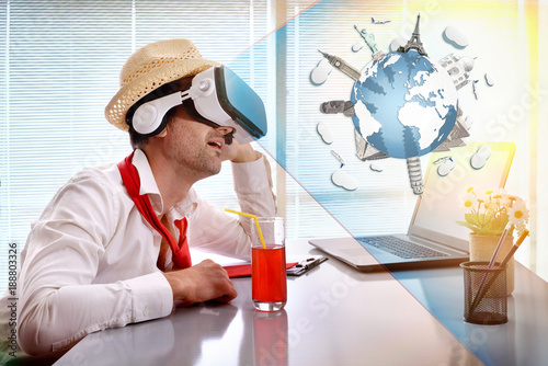 Man at work imagining his vacation with vr glasses representation