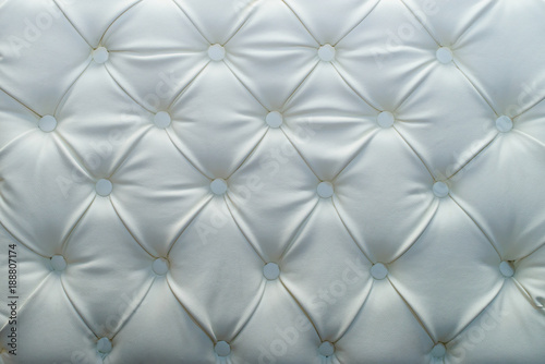 Light horizontal elegant leather texture with buttons for background and design