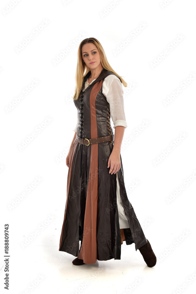 full length portrait of girl wearing brown fantasy costume. standing pose on white studio background. full length portrait of girl wearing brown fantasy costume. standing pose on white studio background.