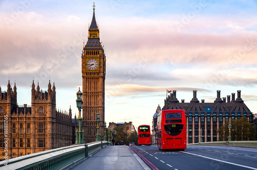 Canvas Print London cityscape with Double Decker buses move along the Westminster Bridge to E