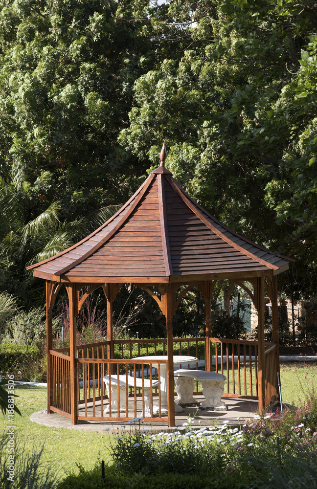 Naklejka premium A pavilion style summer house situated in a large garden