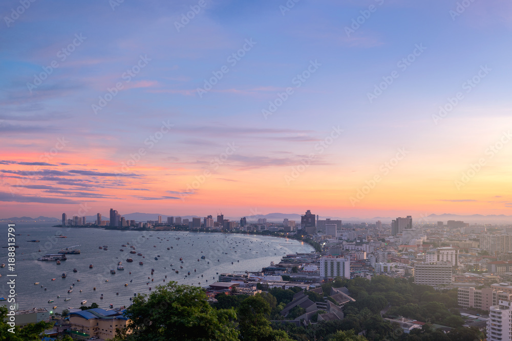 Pattaya City and Sea with sunrise, Thailand. Pattaya city skyline and pier at sunset in Pattaya Chonburi Thailand