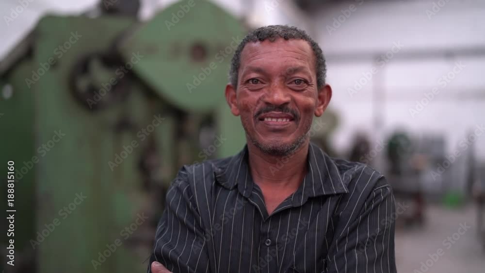 Portrait of Worker on Factory on background Portrait of Worker on Factory on background