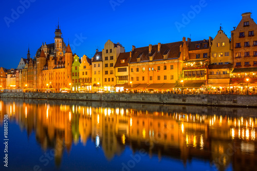 Gdansk at night reflected in Motlawa river, Poland