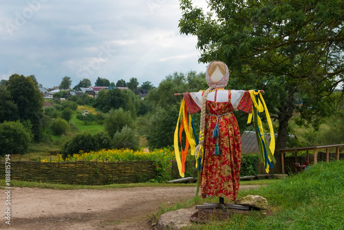 Scarecrow in a national costume in the estate of Count Leo Tolstoy in Yasnaya Polyana in September 2017. photo