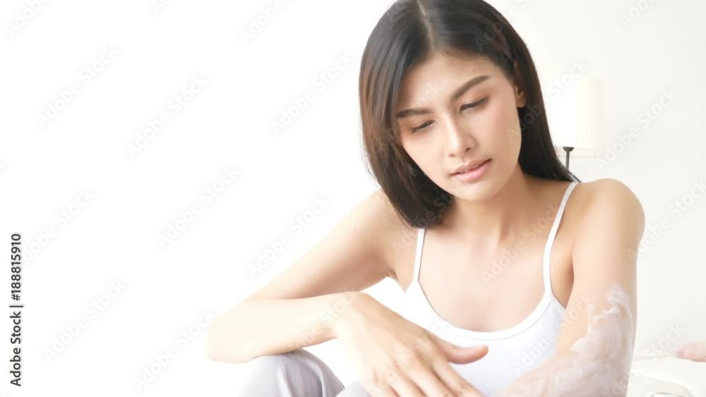 Attractive asian woman using serum at bedroom, Woman lifestyle concept. Attractive asian woman using serum at bedroom, Woman lifestyle concept.