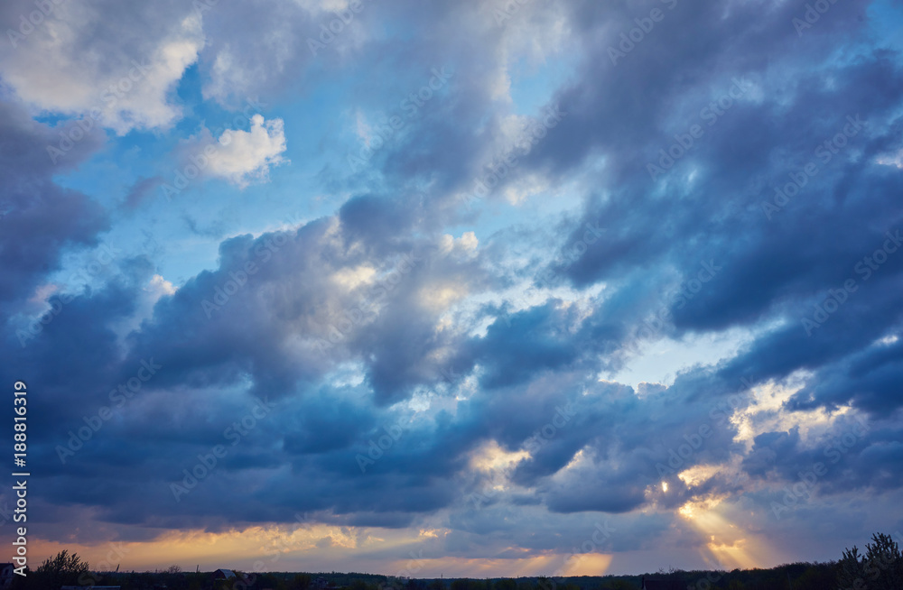 Beautiful, heavy clouded blue sunset sky Beautiful, heavy clouded blue sunset sky