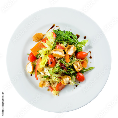 Italian food. Delicious salad with cheese mozzarella and fresh tomatoes isolated on white background. Top view, flat lay