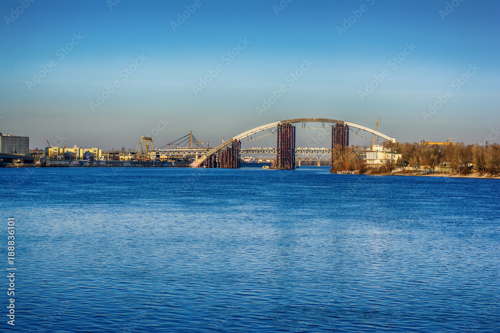 The view from Postal Square to new bridge construction on the Dnieper river, Kiev, Ukraine