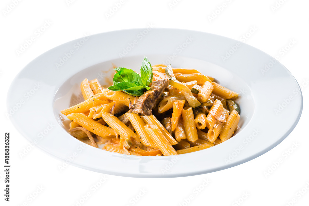 Traditional Italian cuisine. Penne pasta in tomato sauce with chicken decorated with basil in a white plate isolated on white background Traditional Italian cuisine. Penne pasta in tomato sauce with chicken decorated with basil in a white plate isolated on white background