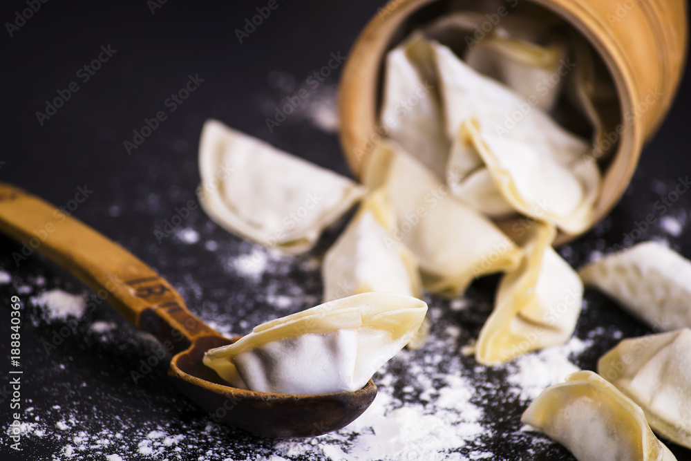 raw dumplings stuffed with meat on the table raw dumplings stuffed with meat on the table