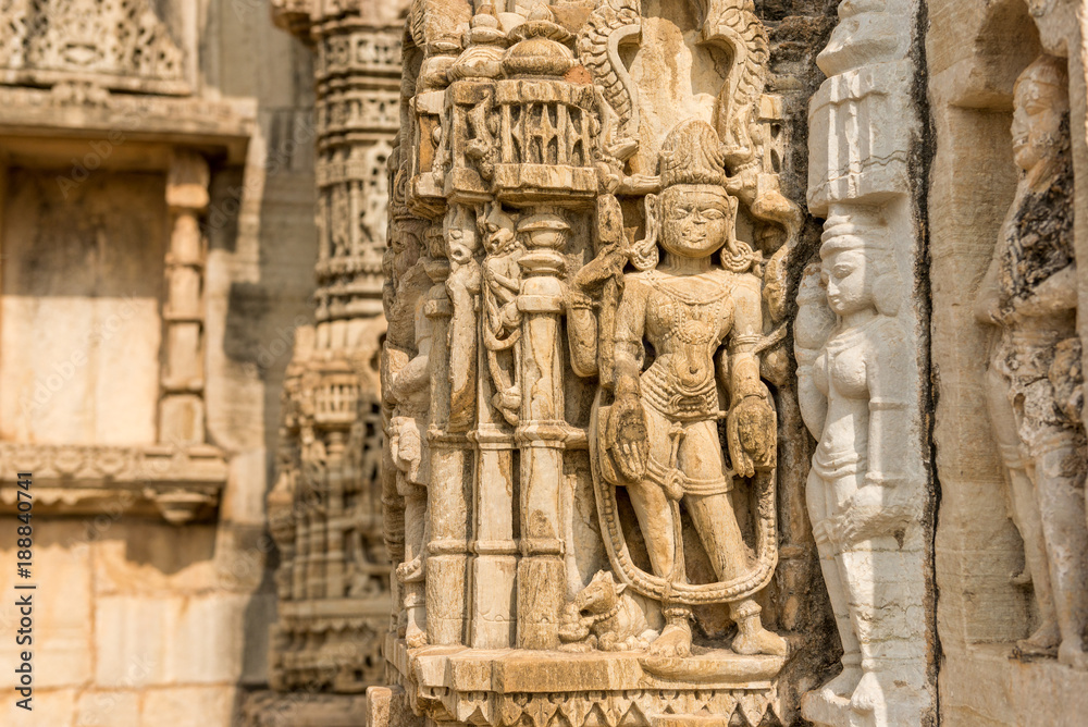 relief figures on the walls of Vijaya Stambha Tower in Chittorgarh, Rajasthan