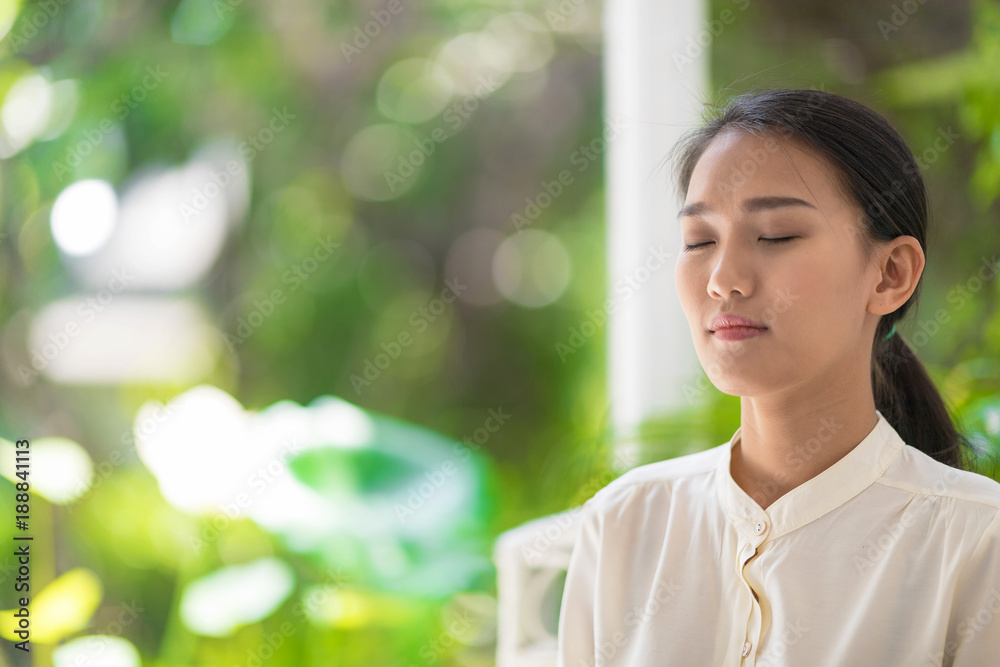 Beautiful young woman meditating Beautiful young woman meditating