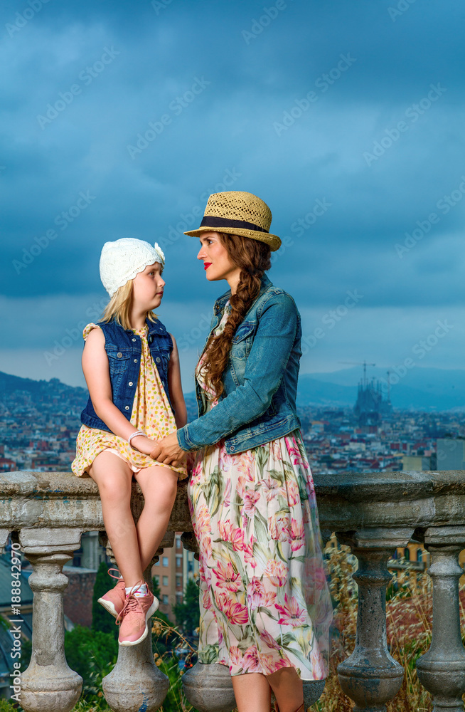 mother and daughter travellers in Barcelona enjoying evening
