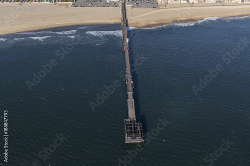 Aerial view of fire damaged Seal Beach Municipal Pier in Orange County, California.