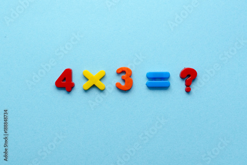 mathematical actions on blue paper background