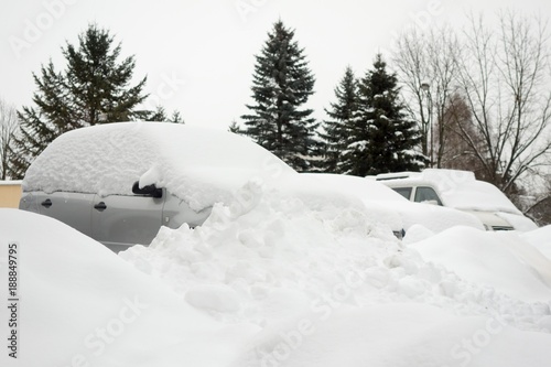 cars in a street covered by a lot of snow © Branislav