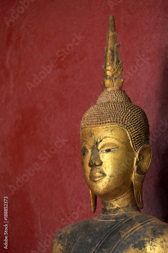 Buddha statues in Wat Xieng Thong (Golden Temple) in Luang Prabang , Laos. The temple is open to the public.