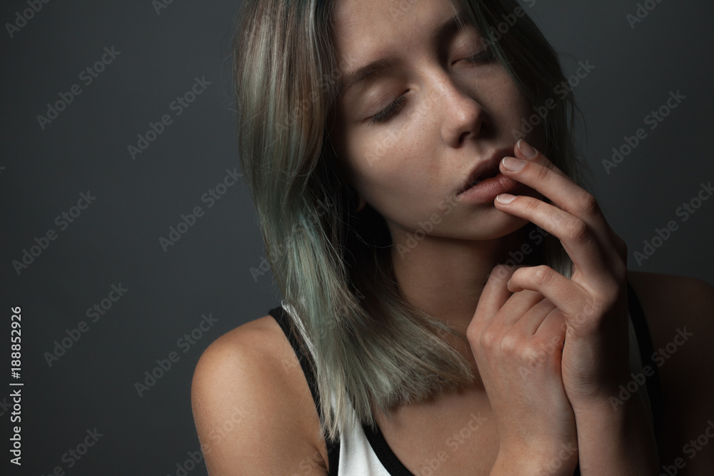 Portrait of a gentle young woman. Eyes closed Portrait of a gentle young woman. Eyes closed