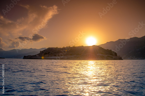 View of the island of Spinalonga with calm sea. Here were isolated lepers  humans with the Hansen s desease  gulf of Elounda  Crete  Greece. 