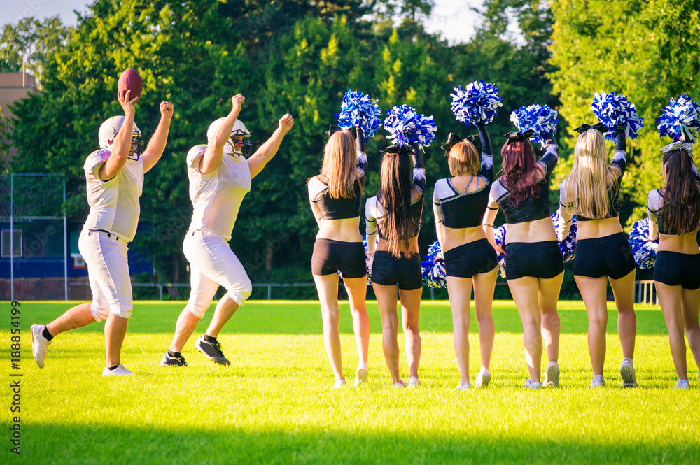 Obraz premium American Football Players With Cheerleaders