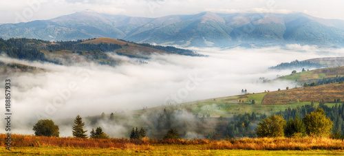 foggy morning. a picturesque autumn dawn in the Carpathian Mountains © sergnester