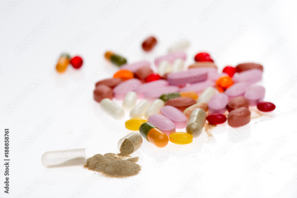 Colored pile of pills on white backgound Colored pile of pills on white backgound