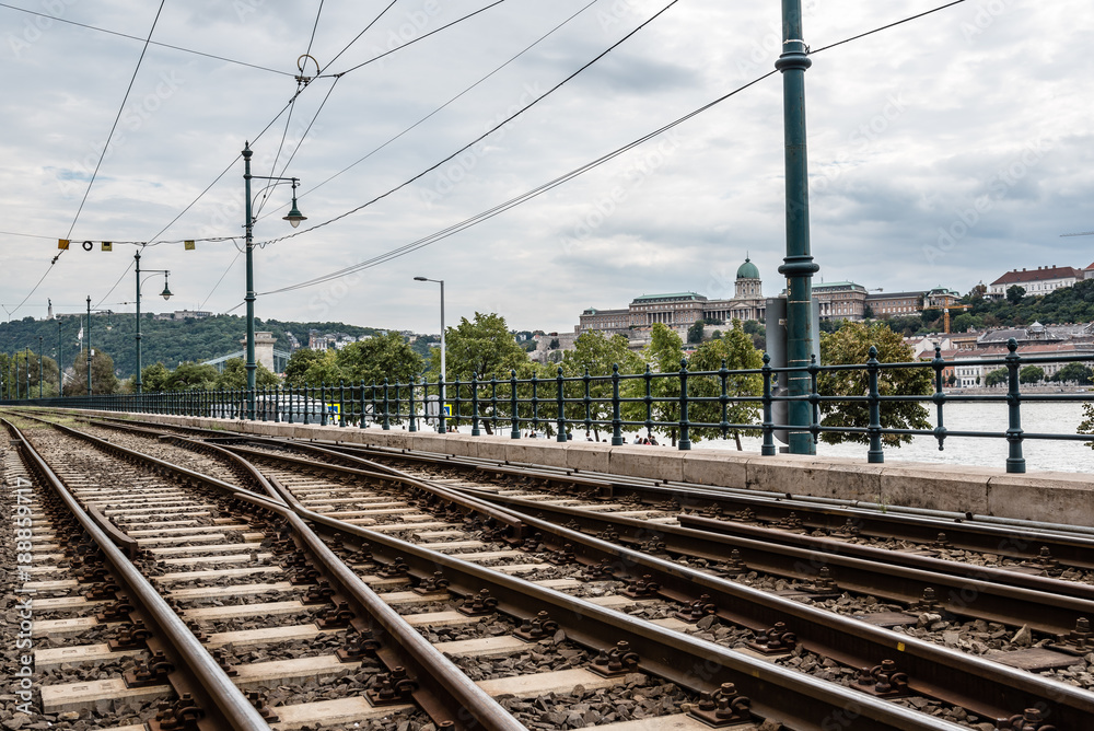 Railway tracks in riverbank of Danube river in Budapest.