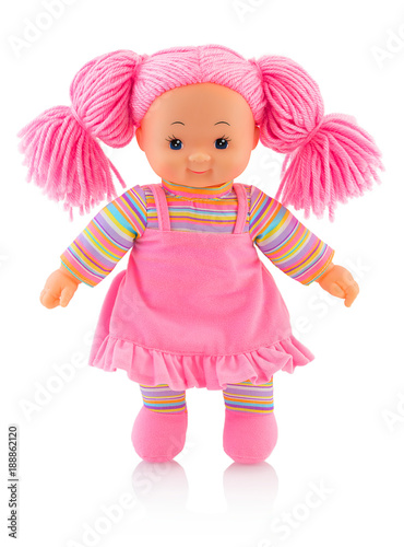 Pinky plushie doll isolated on white background with shadow reflection. Nice contemporary rag baby with pink hair. Modern joyfully rag baby. Pinky doll on white backdrop.