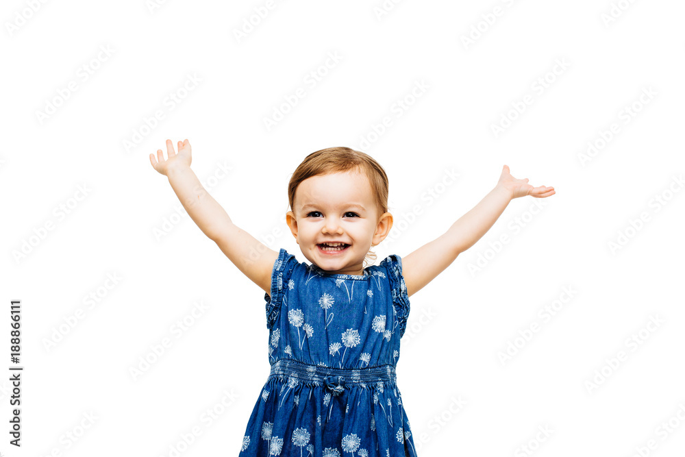 Studio portrait of smiling girl with arms raised Studio portrait of smiling girl with arms raised