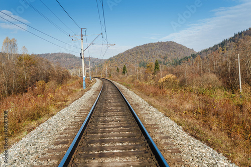 rail road in mountains in autumn photo