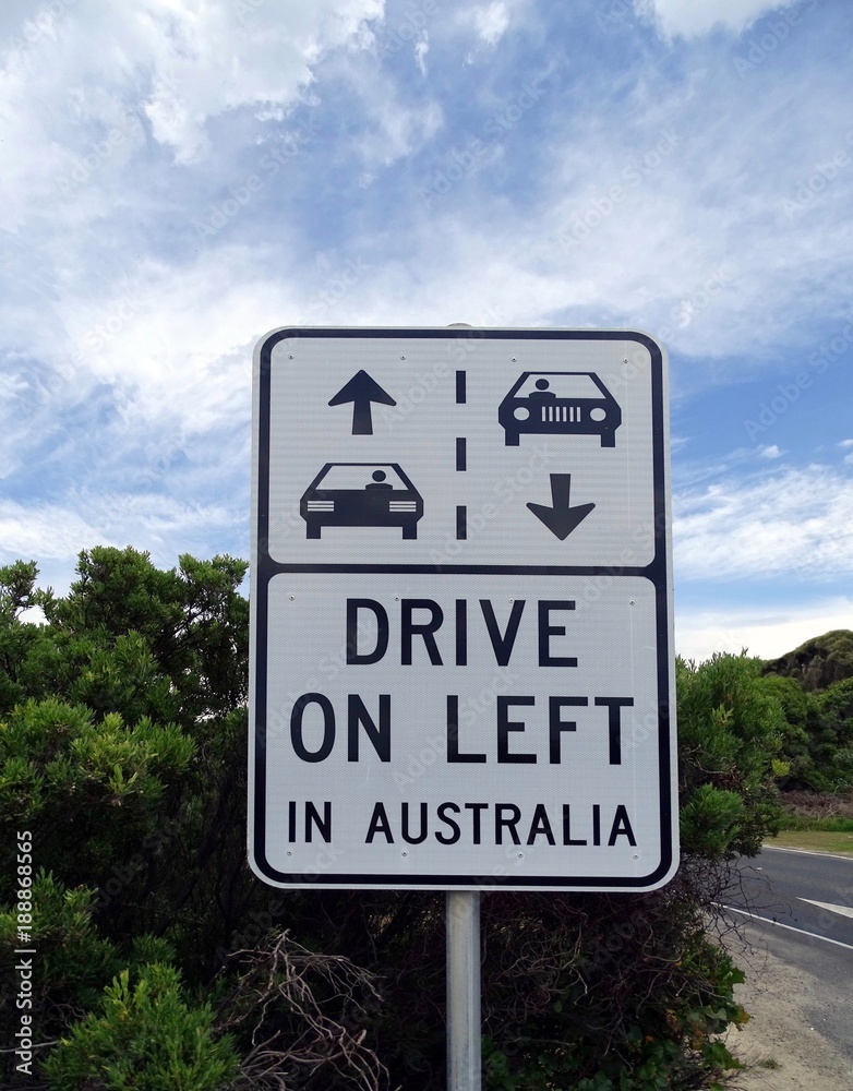  A road sign warning that drivers must adhere to the left hand side of the road when driving in Australia.           