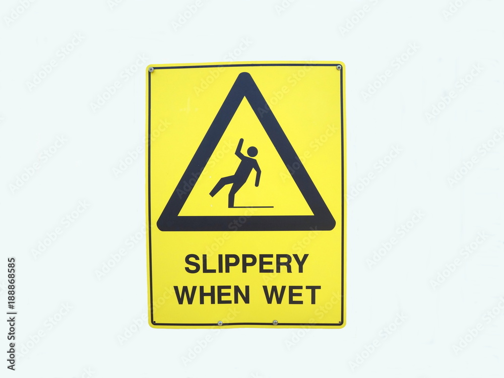 A warning sign depicting someone falling over due to it being slippery when wet
A warning sign depicting someone falling over due to it being slippery when wet